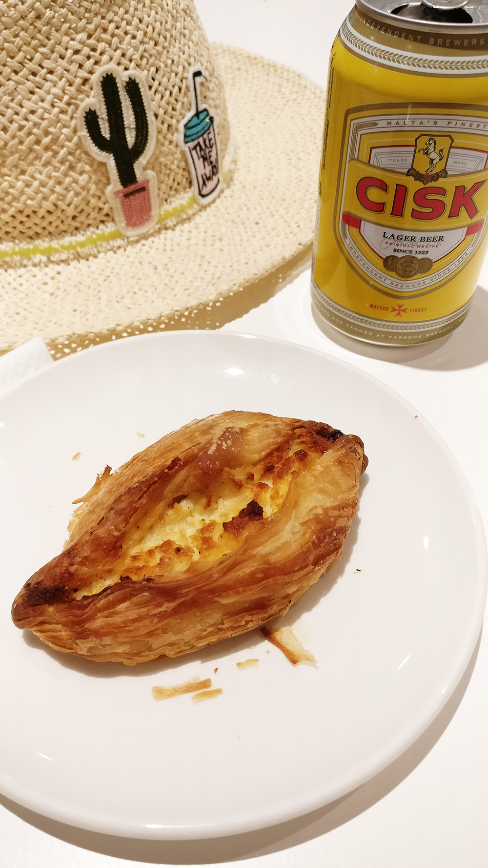 About Malta - Eating pastizzi and drinking Cisk