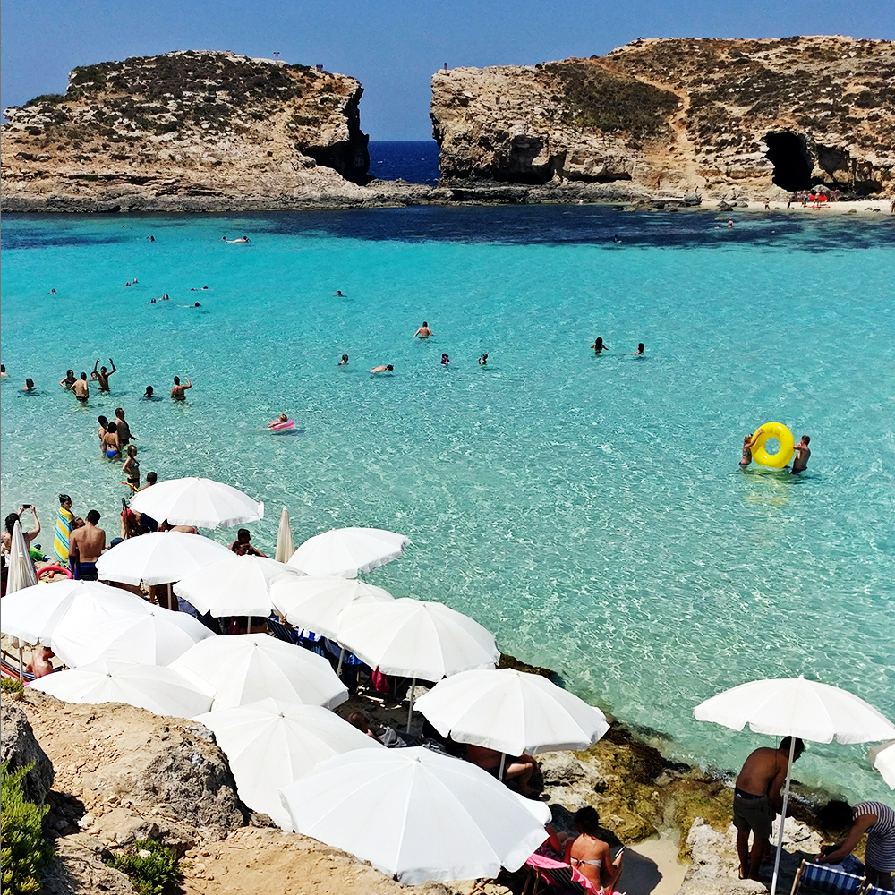 The crystal clear azure water in Blue Lagoon, Comino - Best beaches in Malta | Aliz’s Wonderland